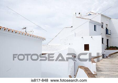 Street of white houses View Large Photo Image Stock Photo - Street of white houses. Fotosearch