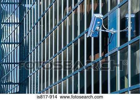 Picture - Surveillance camera on building. Fotosearch