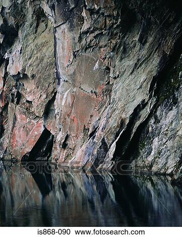 Water and cave wall View Large Photo Image Stock Image - Water and cave wall. Fotosearch