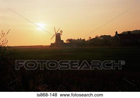 Windmill and village View Large Photo Image Stock Photo - Windmill and village. Fotosearch