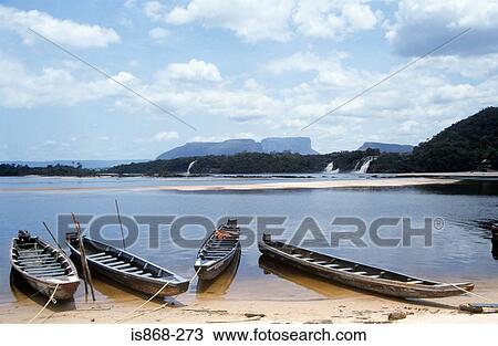 Boats on shore of lake View Large Photo Image Stock Image - Boats on shore of lake. Fotosearch