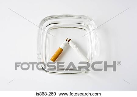 Broken cigarette in an ashtray View Large Photo Image Stock Image - Broken cigarette in an ashtray. Fotosearch