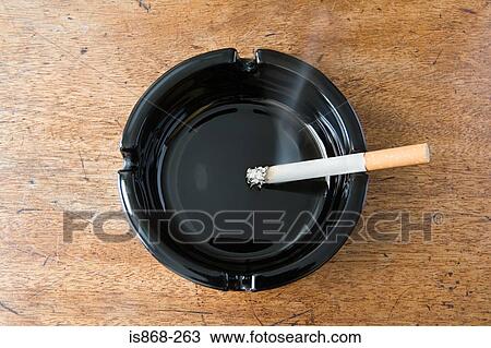 Cigarette burning View Large Photo Image Stock Image - Cigarette burning. Fotosearch