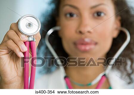 Doctor with stethoscope View Large Photo Image Picture - Doctor with stethoscope. Fotosearch