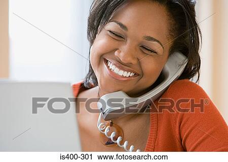 Happy woman on telephone View Large Photo Image Stock Image - Happy woman on telephone. Fotosearch