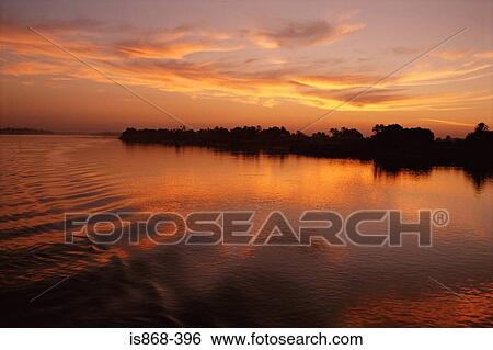 Stock Photograph - River nile at sunset. Fotosearch