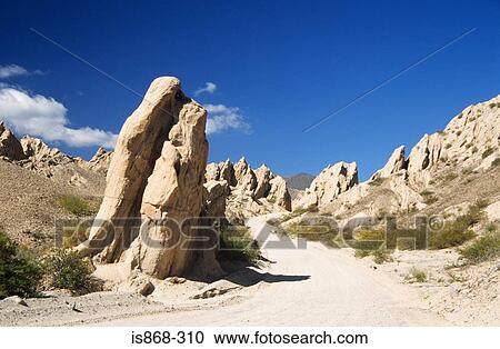Road with rock formations View Large Photo Image Stock Image - Road with rock formations. Fotosearch