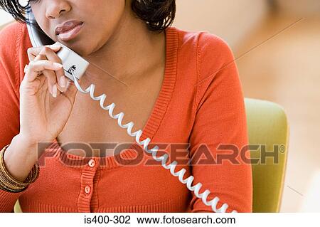 Stock Image - Woman on telephone. Fotosearch