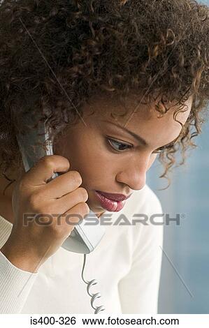 Woman on telephone View Large Photo Image Stock Photograph - Woman on telephone. Fotosearch