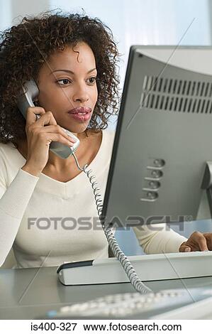 Woman working View Large Photo Image Stock Photo - Woman working. Fotosearch