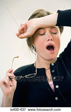 Woman yawning View Large Photo Image Stock Photo - Woman yawning. Fotosearch