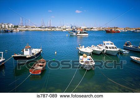 Boats moored in a harbour View Large Photo Image Stock Photo - Boats moored in a harbour. Fotosearch