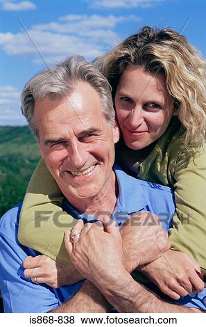 Couple hugging View Large Photo Image Stock Photo - Couple hugging. Fotosearch