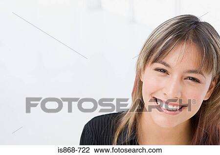 Stock Image - Happy young woman. Fotosearch