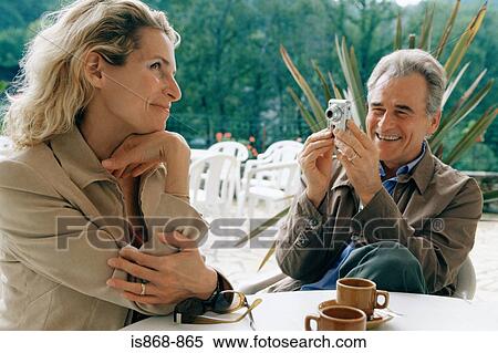 Man taking picture of wife View Large Photo Image Stock Photography - Man taking picture of wife. Fotosearch