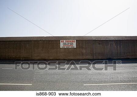 Sign on a sea wall View Large Photo Image Stock Image - Sign on a sea wall. Fotosearch