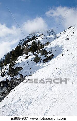 Ski lift near mountains View Large Photo Image Stock Photo - Ski lift near mountains. Fotosearch