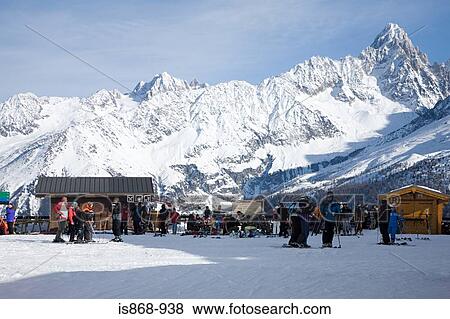 Skiers near mountain View Large Photo Image Stock Photo - Skiers near mountain. Fotosearch