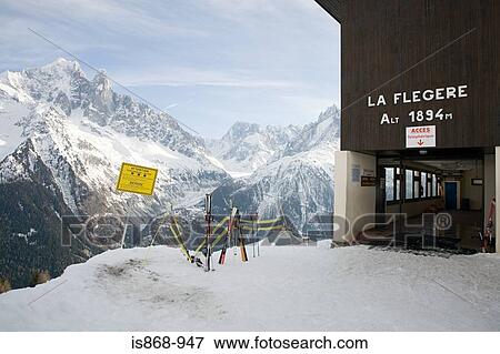 Skis and sign near mountains View Large Photo Image Stock Photo - Skis and sign near mountains. Fotosearch