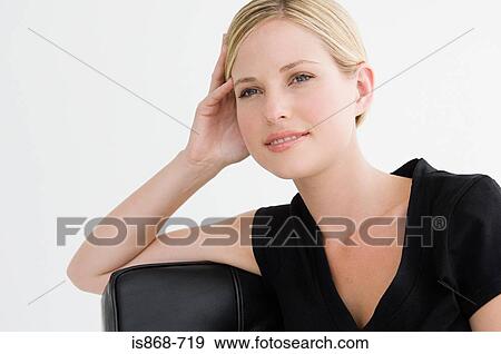 Young woman thinking View Large Photo Image Stock Photo - Young woman thinking. Fotosearch
