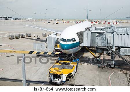 Aeroplane on runway View Large Photo Image Picture - Aeroplane on runway. Fotosearch