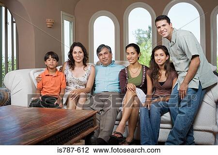Stock Image - Family on sofa. Fotosearch