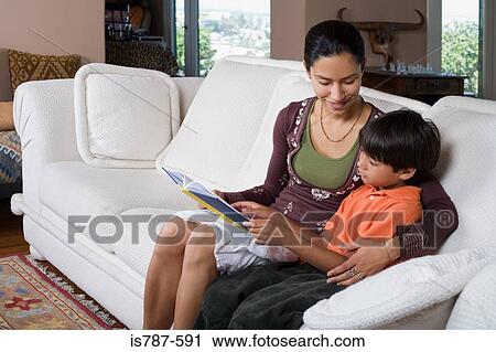 Woman and boy reading View Large Photo Image Stock Image - Woman and boy reading. Fotosearch