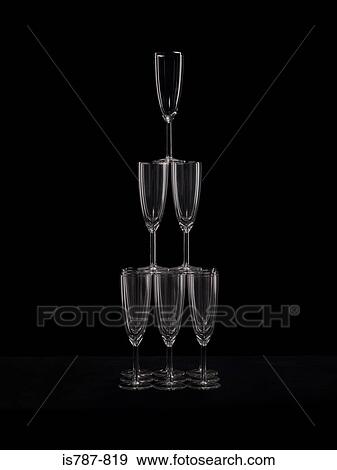 Stack of champagne flutes View Large Photo Image Stock Photo - Stack of champagne flutes. Fotosearch