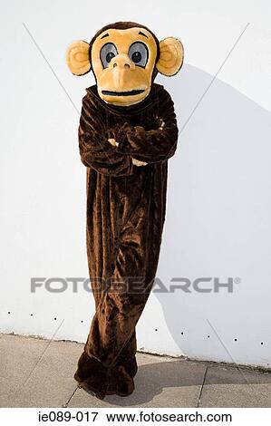 Stock Photo - Displeased person in monkey costume. Fotosearch
