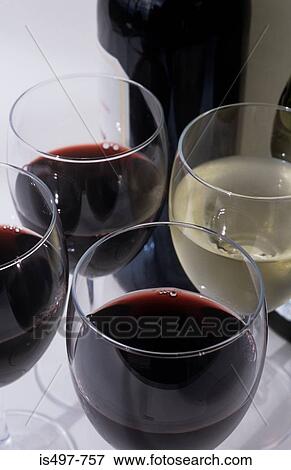 Stock Photo - Glasses of red and white wine. Fotosearch
