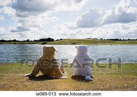 People in costumes by lake View Large Photo Image Stock Image - People in costumes by lake. Fotosearch