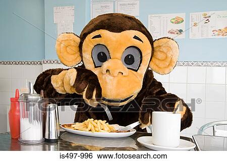 Person in a monkey costume in a cafe View Large Photo Image Stock Photograph - Person in a monkey costume in a cafe. Fotosearch