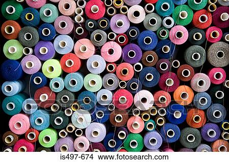 Pile of cotton reels View Large Photo Image Picture - Pile of cotton reels. Fotosearch