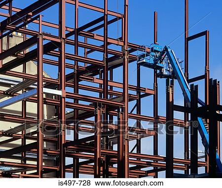 Stock Photo - Scafolding and a cherry picker. Fotosearch