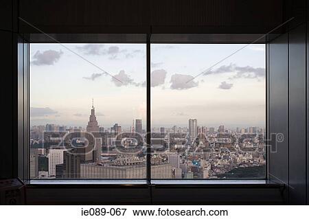 Cityscape through window View Large Photo Image Stock Photo - Cityscape through window. Fotosearch