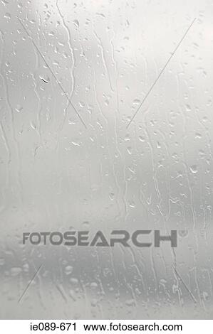 Condensation on a window View Large Photo Image Stock Image - Condensation on a window. Fotosearch
