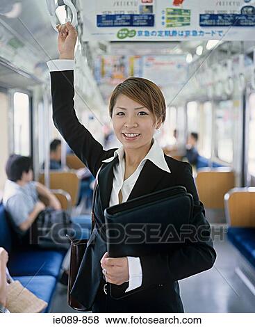 Stock Photo - Female commuter. Fotosearch