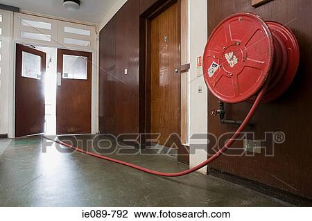 Fire hose in corridor View Large Photo Image Stock Image - Fire hose in corridor. Fotosearch