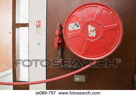 Fire hose View Large Photo Image Stock Photo - Fire hose. Fotosearch
