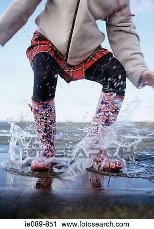 Stock Image - Person splashing. Fotosearch