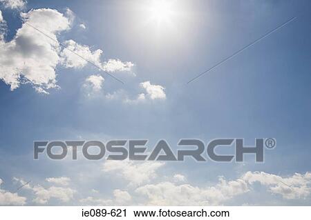 The sun and clouds in the sky View Large Photo Image Stock Image - The sun and clouds in the sky. Fotosearch