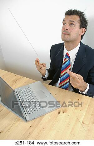 A businessman with fingers crossed View Large Photo Image Picture - A businessman with fingers crossed. Fotosearch