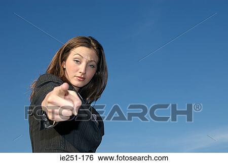 A businesswoman pointing View Large Photo Image Stock Photograph - A businesswoman pointing. Fotosearch