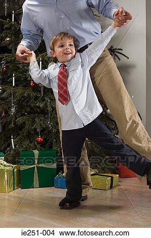 A father and son dancing View Large Photo Image Picture - A father and son dancing. Fotosearch