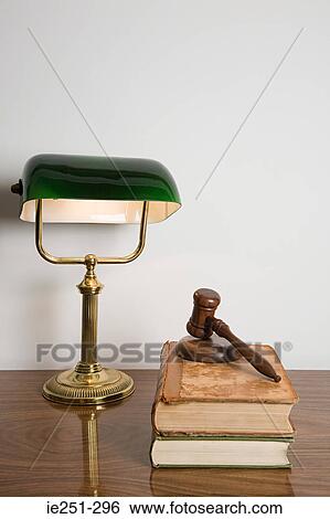 A gavel on top of a book View Large Photo Image Stock Photograph - A gavel on top of a book. Fotosearch