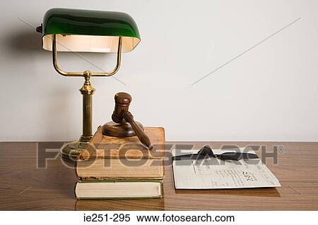 A gavel on top of a book View Large Photo Image Stock Photography - A gavel on top of a book. Fotosearch