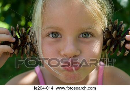 A girl pulling faces View Large Photo Image Picture - A girl pulling faces. Fotosearch