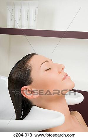 A woman at the hairdressers View Large Photo Image Stock Photo - A woman at the hairdressers. Fotosearch