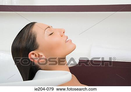 A woman at the hairdressers View Large Photo Image Stock Photo - A woman at the hairdressers. Fotosearch