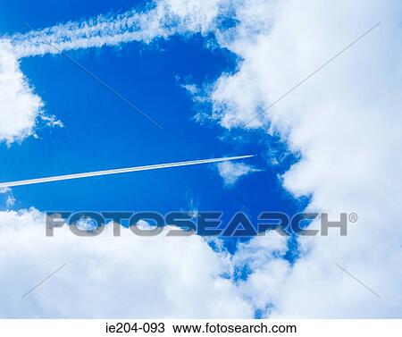 An aeroplanes vapour trail in the sky View Large Photo Image Stock Image - An aeroplanes vapour trail in the sky. Fotosearch